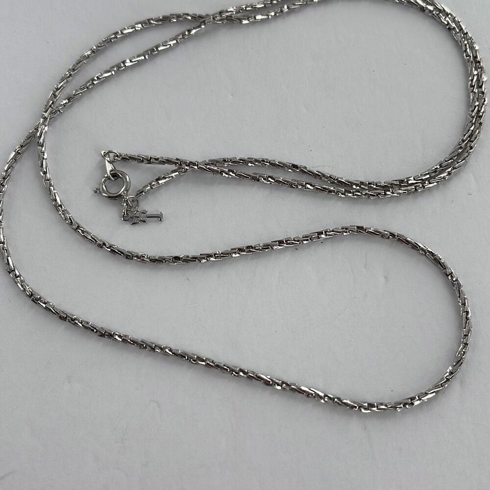Vintage unique Trifari 29” silver colored chain necklace with tag.